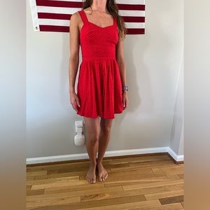 Red sundress with black detail